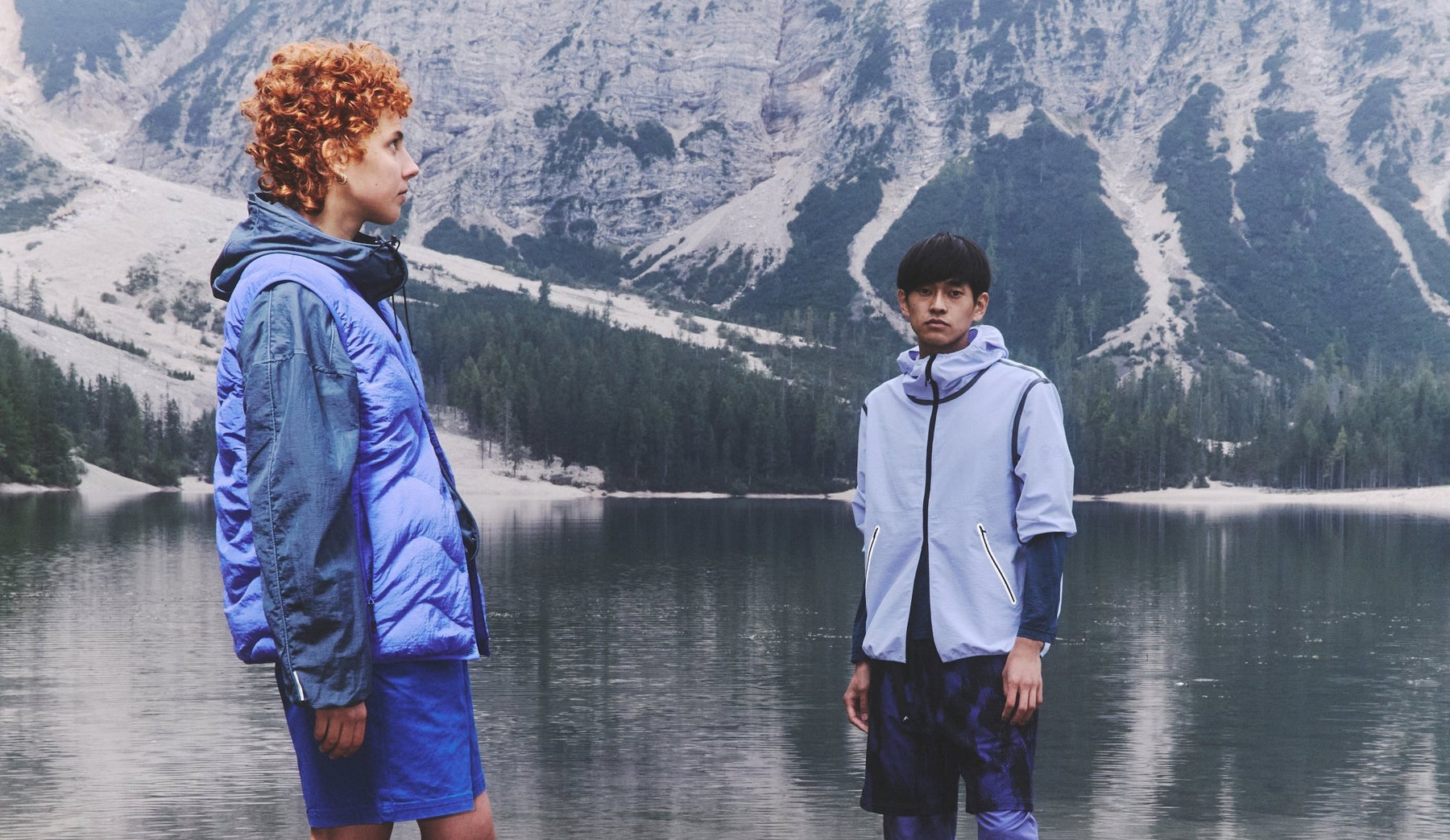 Men Wearing Purple Mountain Observatory Clothing by Mountain Lake.