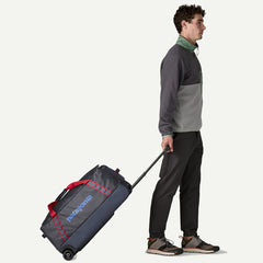 Patagonia Black Hole Wheeled Duffel 70L Smolder Blue / Amanita Red
